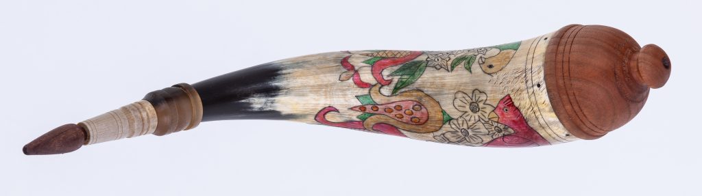 Horn #44 - An applied-tip powder horn with color fraktur engraving of a Carolina parakeet and a Northern Cardinal- Top