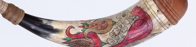 Horn #44 - An applied-tip powder horn with color fraktur engraving of a Carolina parakeet and a Northern Cardinal- Inside with Northern Cardinal and dogwood flowers.
